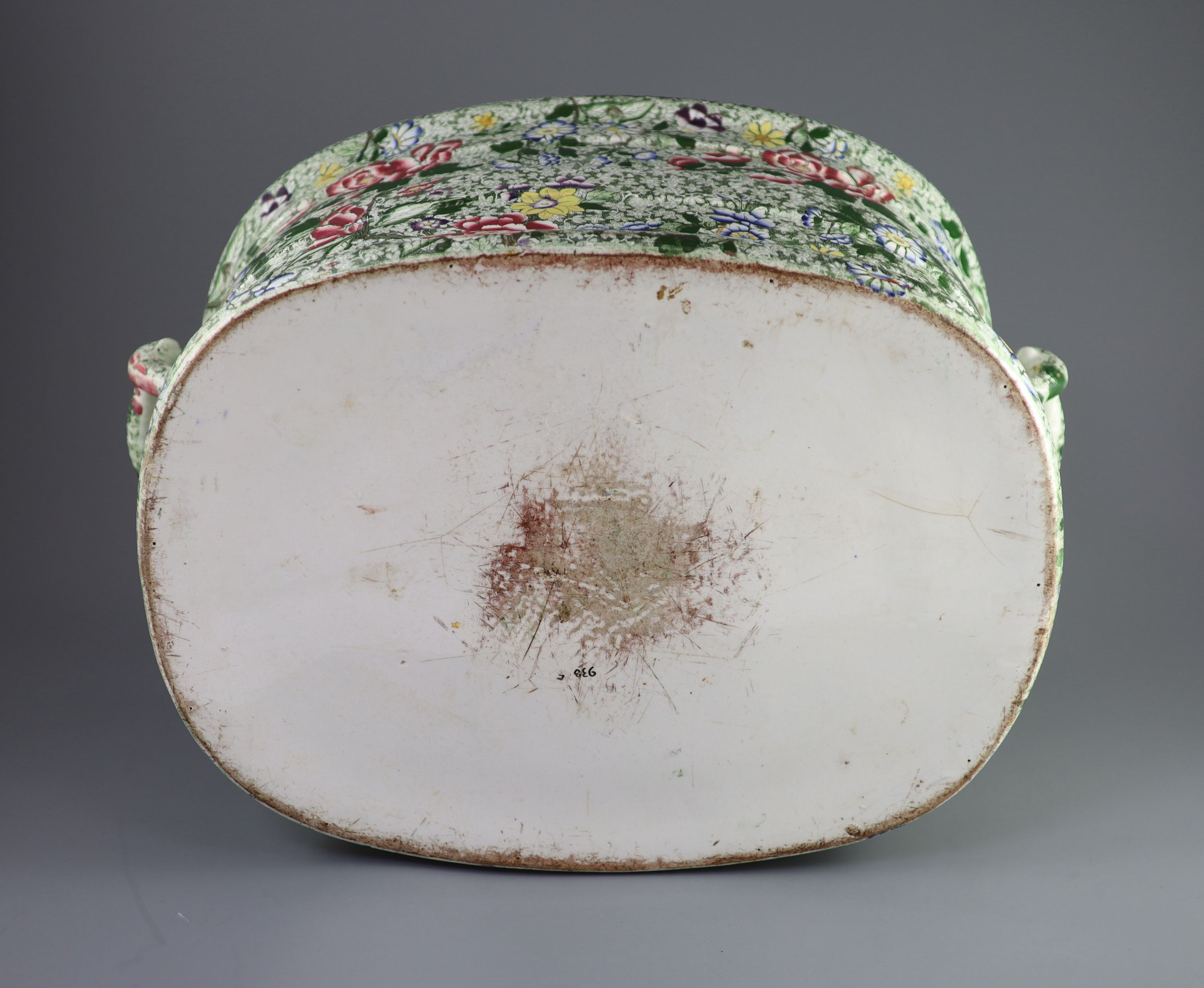 A Victorian ironstone two handled footbath, c.1840, 53cm across